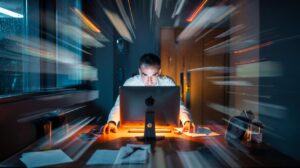 Illustration of cognitive load narrowing focus under task overload in a modern workspace